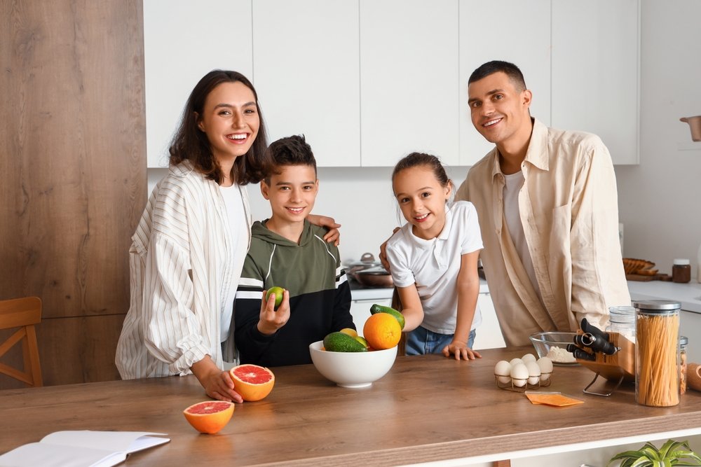 Happy,Family,Cooking,In,Kitchen
